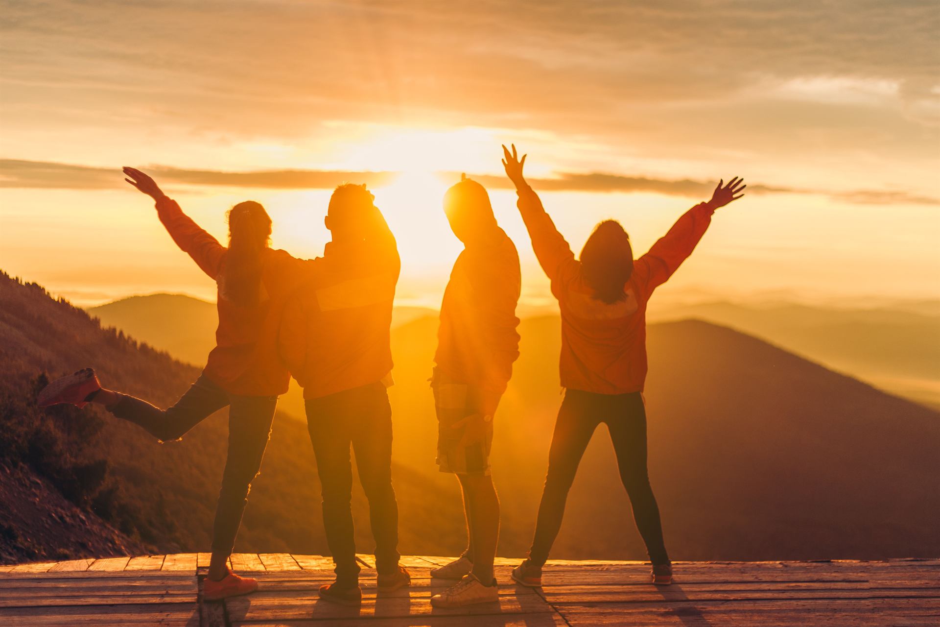 Group at sunrise on a mountain viewpoint